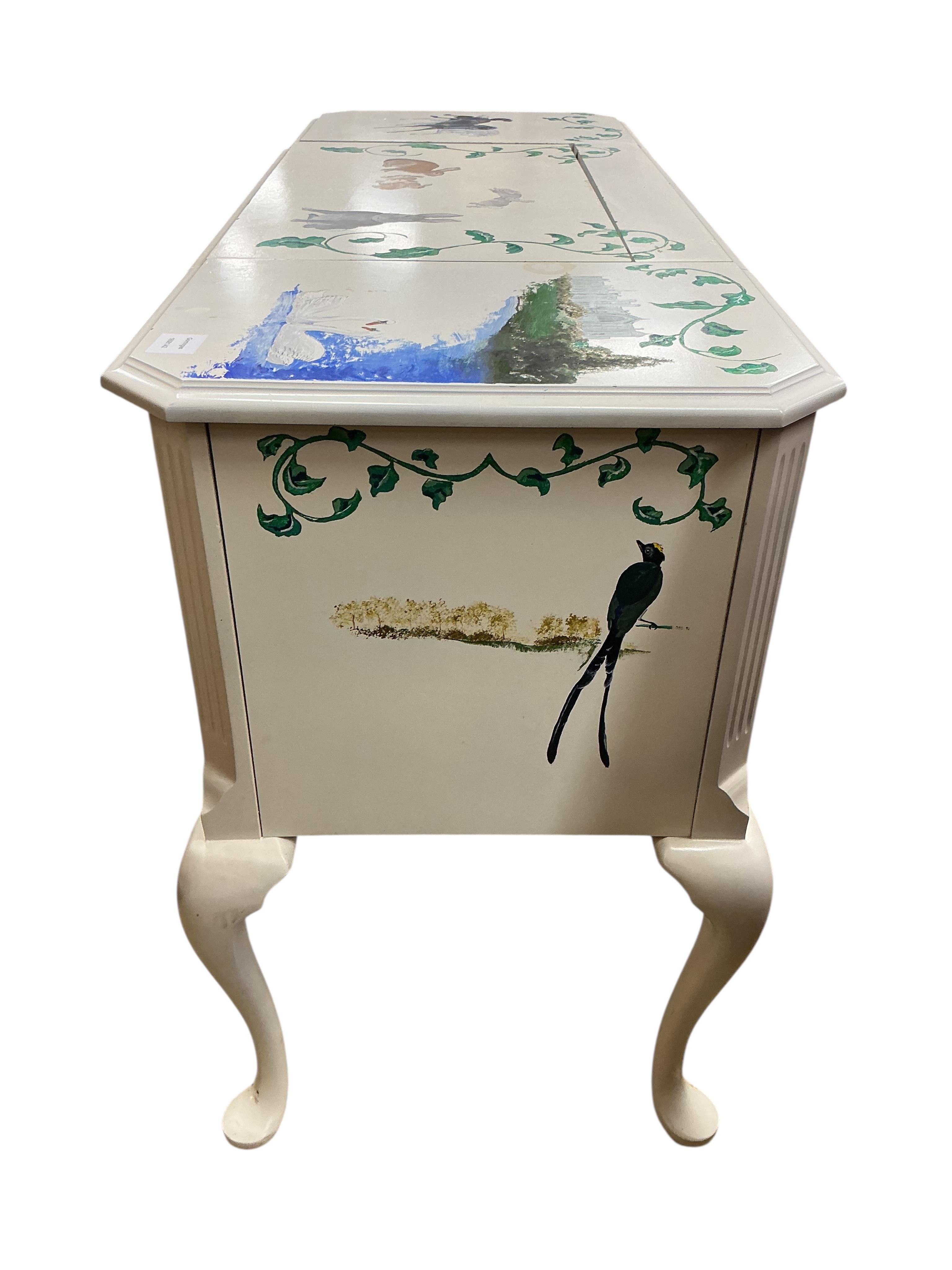 A white painted enclosed dressing table, width 124cm, depth 48cm, height 78cm